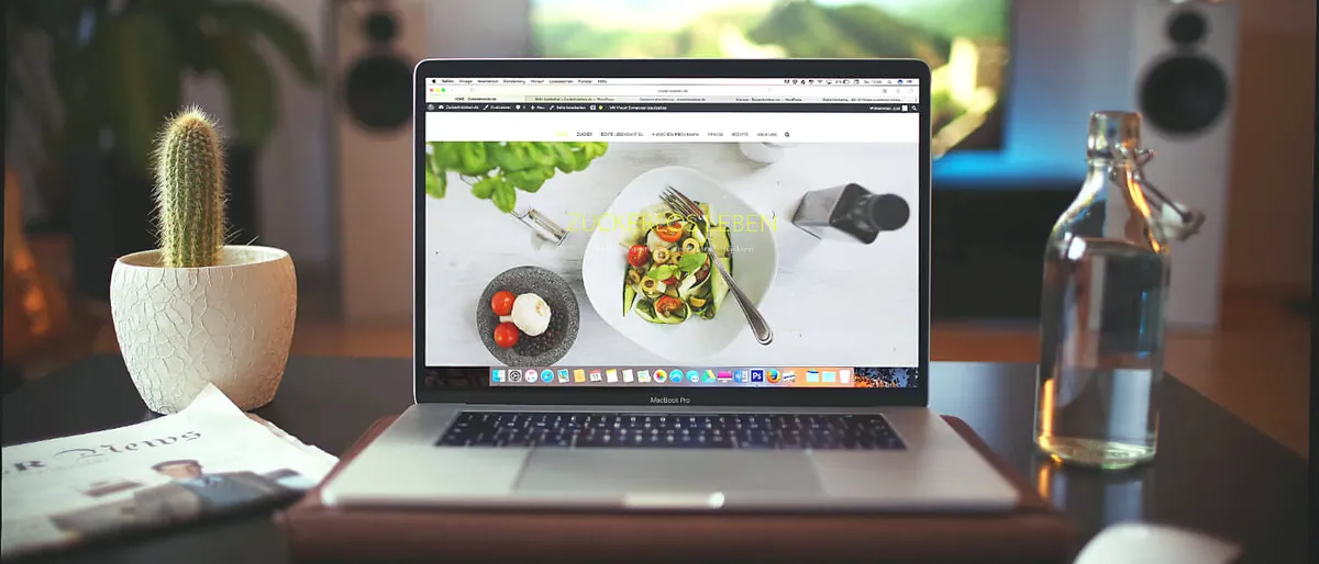 A laptop showing a website