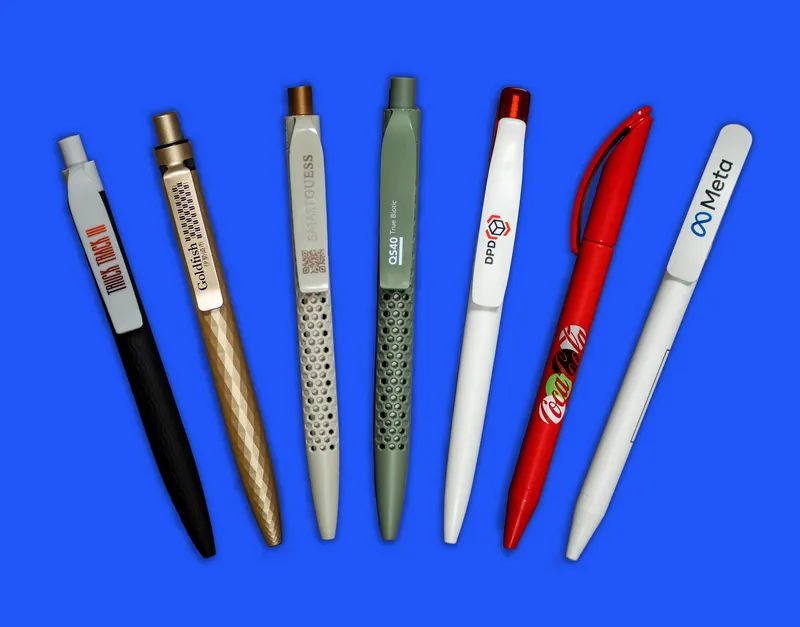 Custom promotional pens on a blue background